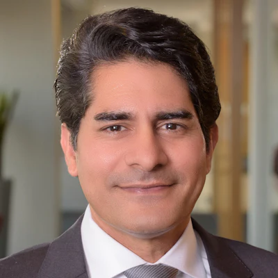 professional headshot of past president of the American Medical Association, Bobby Mukkamala, MD, wearing suit