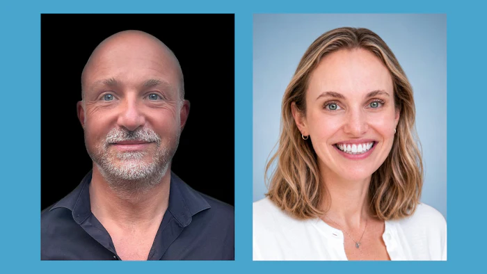 Two professional headshots: bald man with goatee in dark shirt and woman with brown wavy hair in white top, both smiling against blue background